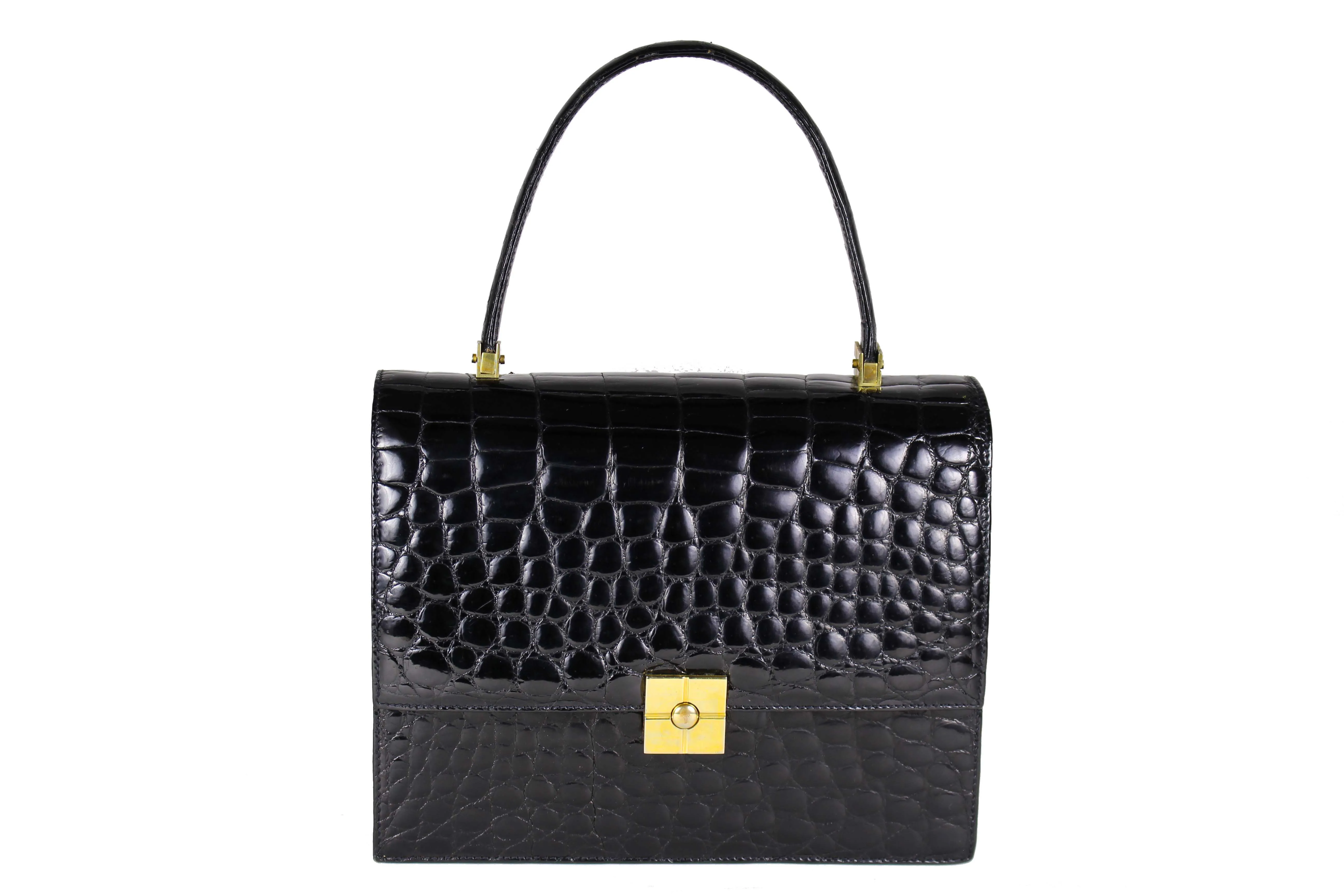 TORRENS jet black crocodile skin handbag with flap and decorative clasp