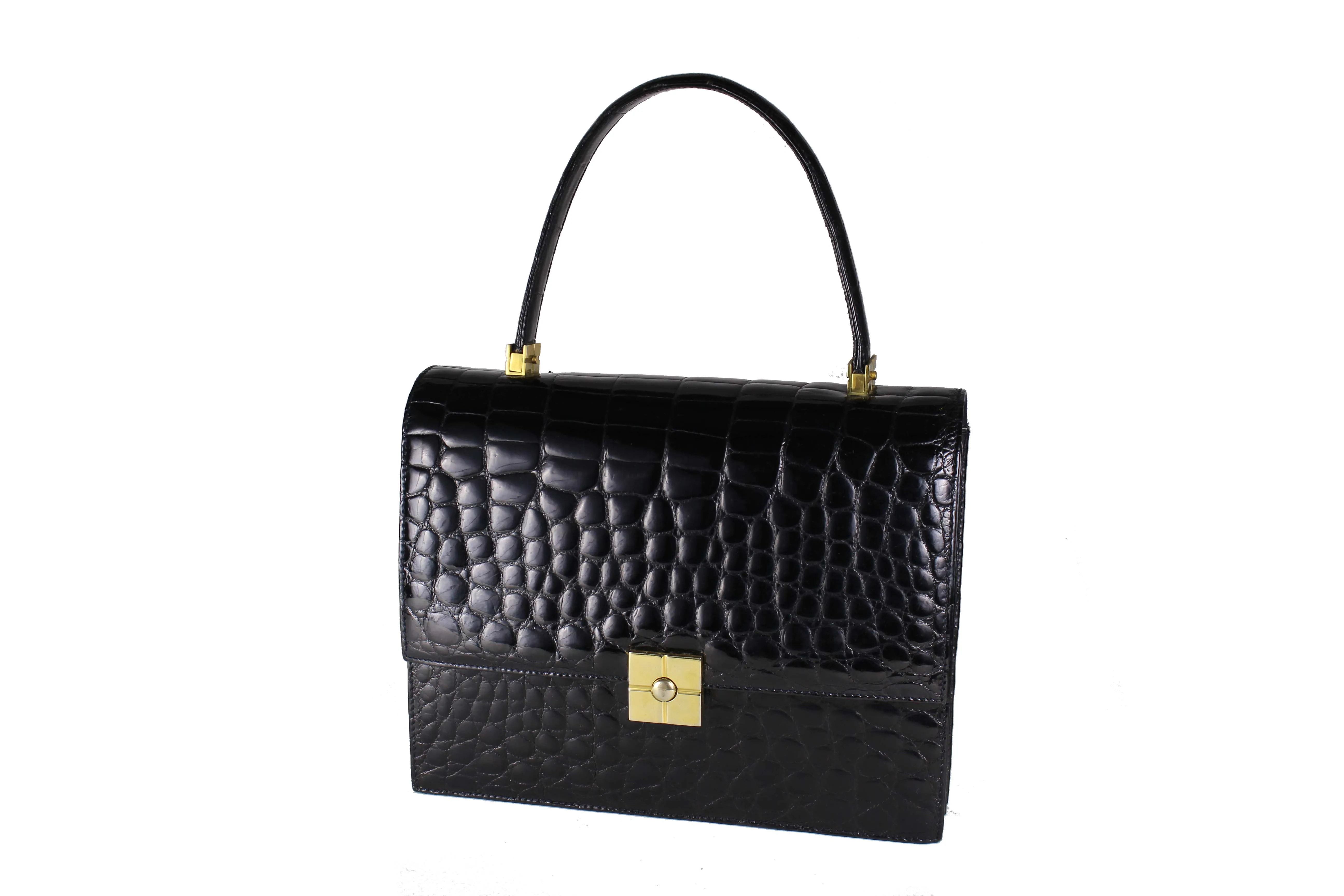 TORRENS jet black crocodile skin handbag with flap and decorative clasp