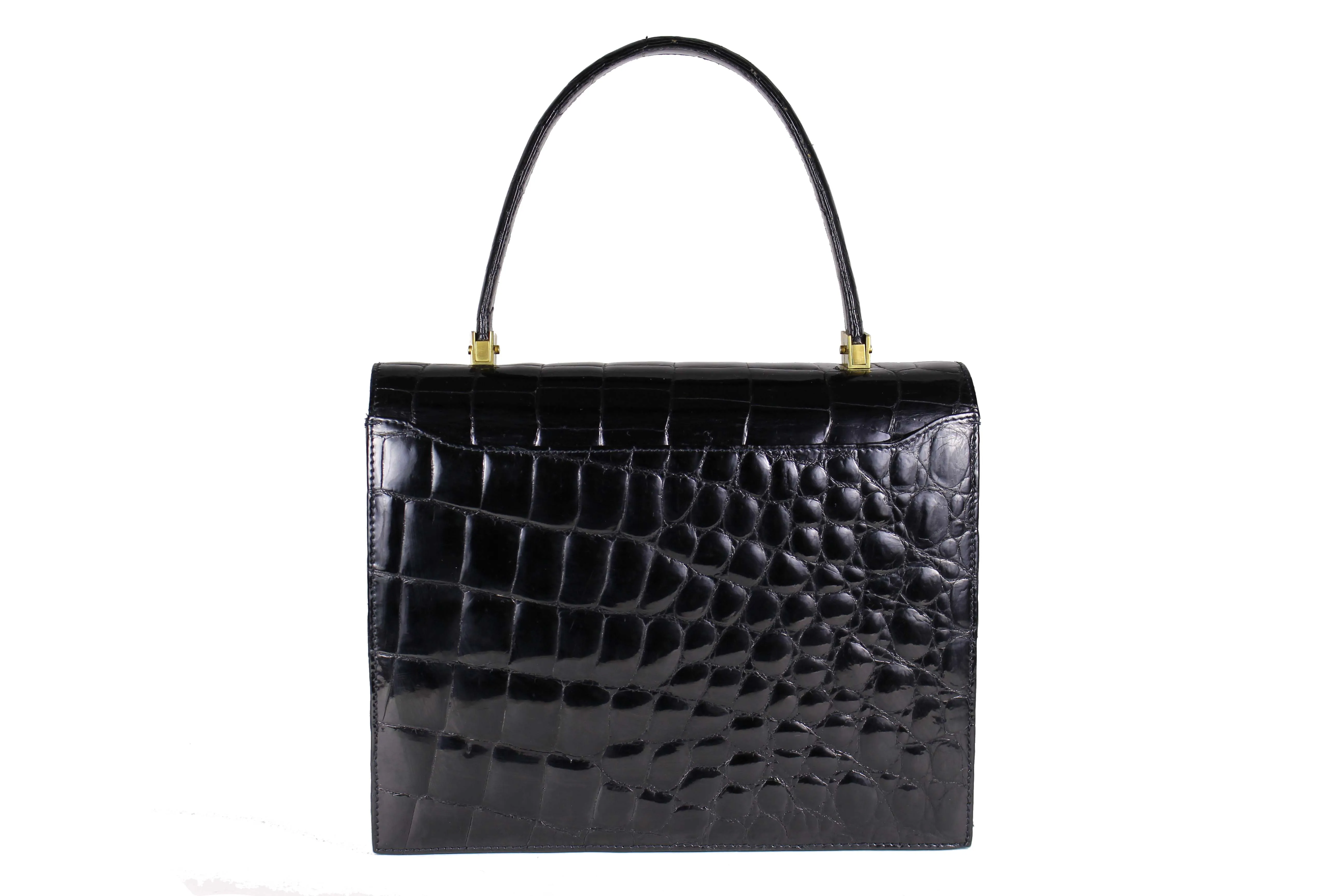 TORRENS jet black crocodile skin handbag with flap and decorative clasp